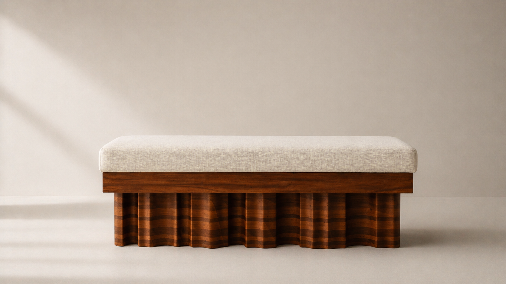 Solid walnut wave bench with fluted base — custom furniture Bangkok